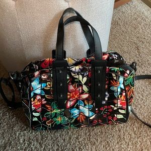 Floral mosaic style handbag